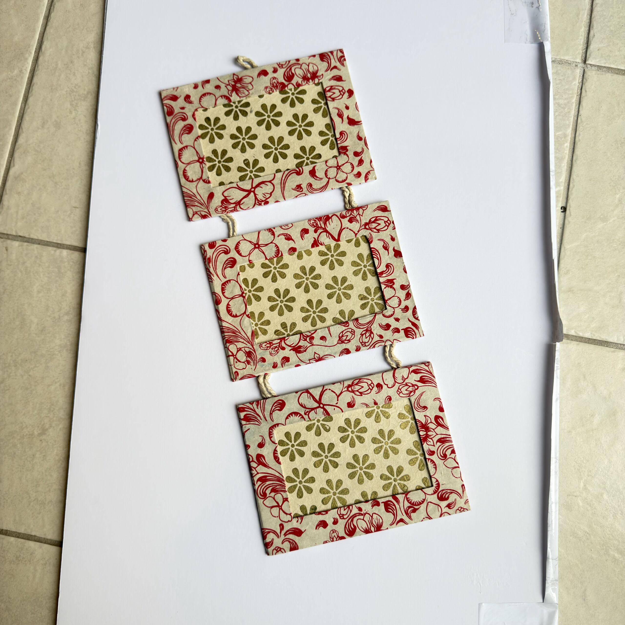 red-floral-triple-lokta-picture-frame