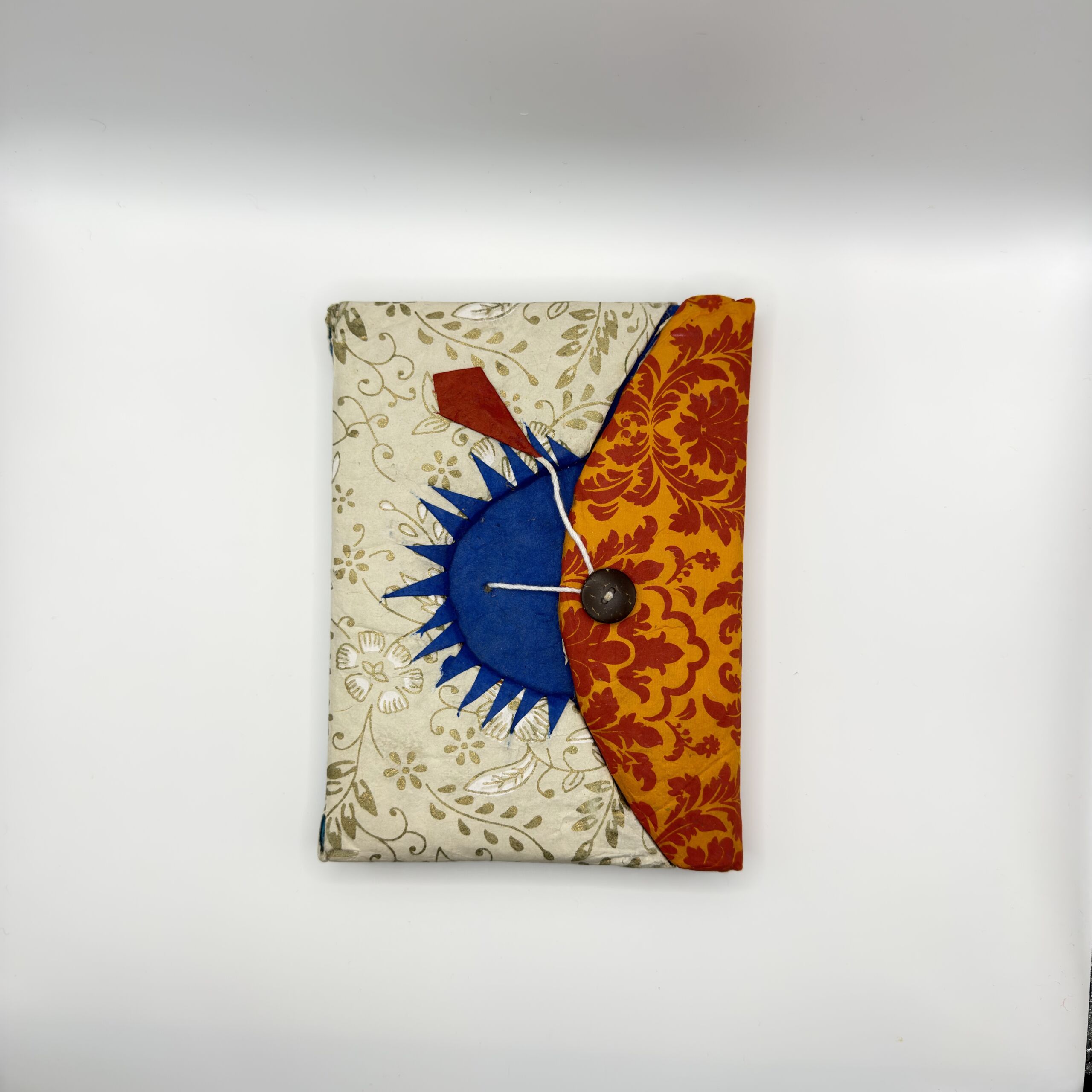 sunburst-patchwork-lokta-button-notebook